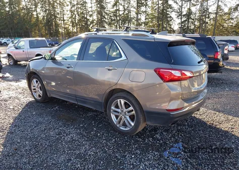 2018 Chevrolet Equinox Premier z USA, uszkodzony, nr VIN 3GNAXWEX4JS520423
